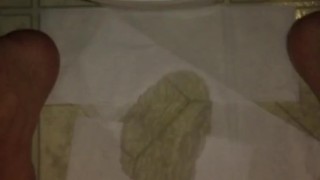 Sitting on the toilet jerking off & huge cumshot all over the floor. Soaked it up with toilet paper.