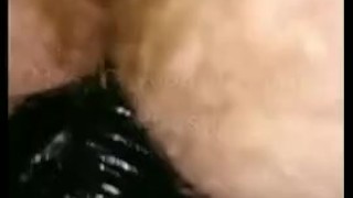 Fucking her hairy pussy with black dildo