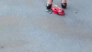 Crush of Red Audi R8 model toy car with Black Pump Stilettos