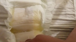 Pissing in open adult diaper