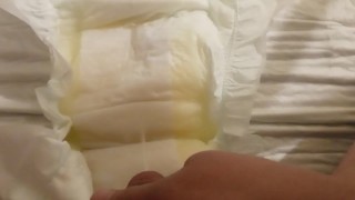 Pissing in open adult diaper
