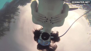 Swimming pool submerged babe masturbates