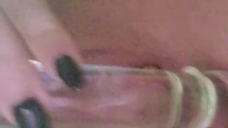 Fucking my little pussy with my glass dildo