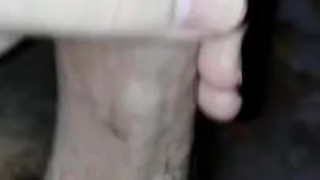 Парень дрочит свой член в постели