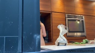 busty brunette Quinn Finite naked in her kitchen