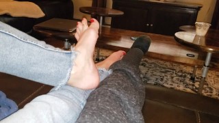 Sexy feet and jeans with toe rings and red polish 