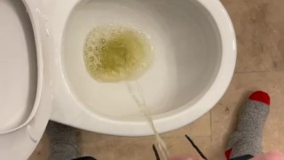 Taking a yellow piss while working on a house