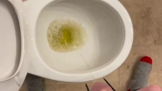 Taking a yellow piss while working on a house
