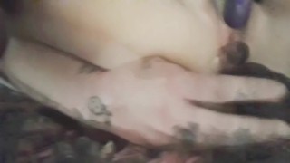 Sexy tattooed milf gets down and dirty with her toys...