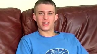 Smooth twink Andy moans while jerking his throbbing cock