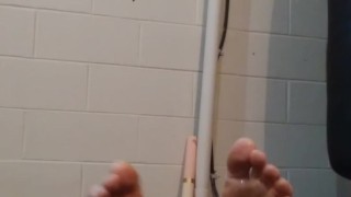 Two Girls torture studs oiled soles with heat gun after he says he's a bad ass and can handle it