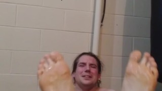 Two Girls torture studs oiled soles with heat gun after he says he's a bad ass and can handle it