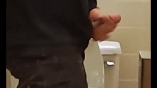 Horny guy jerks off and cums in public bathroom