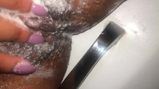 Hairy pussy getting washed