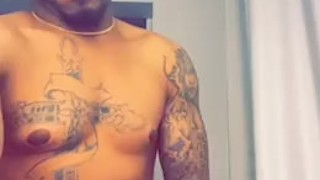 tattooed guy play wit his BBC