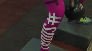 Blonde in leggings with a beautiful booty in the gym