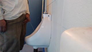 Me peeing in a public urinal