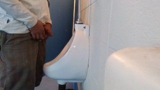 Me peeing in a public urinal