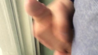 Jerking my big cock in the window