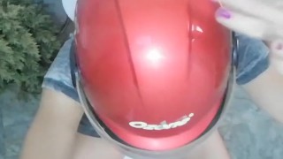 Biker in a red helmet pisses during her period. Tik Tok 