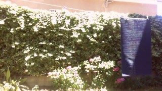 Nicoletta sunbathes in a public garden wearing a big dirty diaper