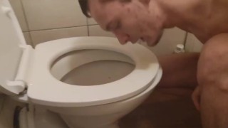 Skinny teen pissed in the toilet and on the toilet seat then he licks it up