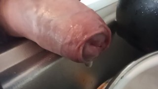 Closeup foreskin pissing on dishes
