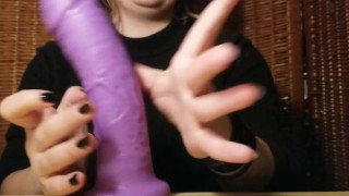Wanna see all my sex toys? Tattooed goth babe shows off all her dildos