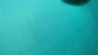 Boy masturbates in the pool / squirting cum