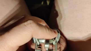 putting on my modified cage so it uses my prince albert piercing