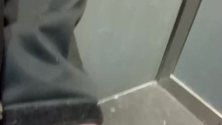 Construction worker caught jerking in elevator