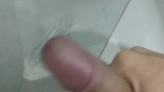 Cumming bathroom jerking cock 