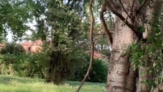 Outdoors, blonde girl dancing and musturbing in a public park