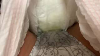 Peeing in panties inside a diaper