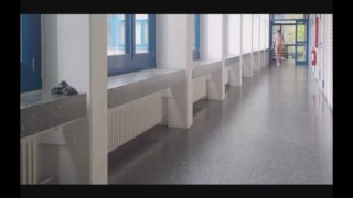 boy walking naked on school corridor