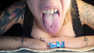 Long and spitty tongue show
