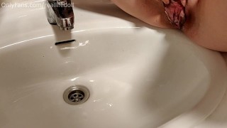 Peeing in the sink with creampied pussy