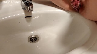 Peeing in the sink with creampied pussy