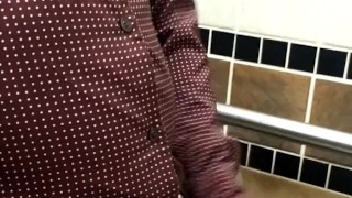Ginger playing with cock at work