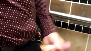 Ginger playing with cock at work