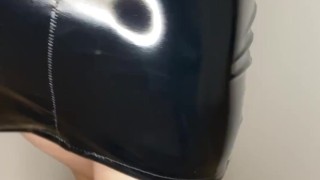 Girl showing her ass in latex dress