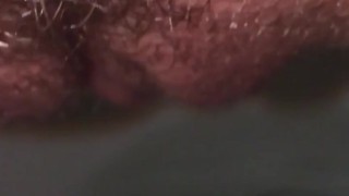 Upclose and slow motion of swollen red pussy pissing immediately after sex