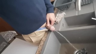 Pissing into my kitchen sink