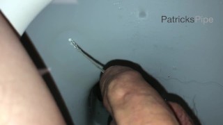 Pissing in a dirty public toilet