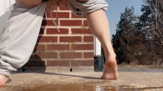 Bent over power pissing outside and farting loudly