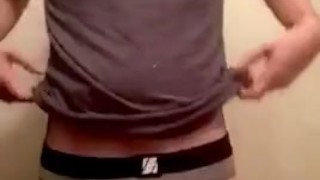 Twink grabbing and teasing big bulge in briefs 