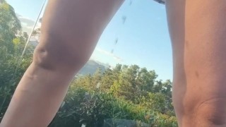 Risky outdoor pee on balcony 