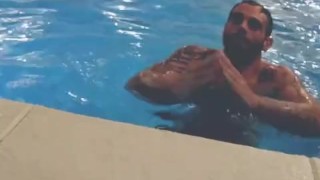 Italian guy at the pool showing off