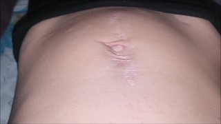 Relaxed belly button close up and breathing