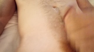 Hairy Ginger cums on stomach